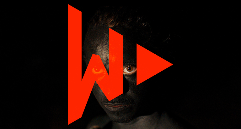 Image of a child in warpaint from the 2017 movie Monos overlaid with the WatchLister logo